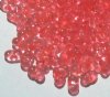 25 grams of 3x7mm Transparent Coral Farfalle Seed Beads